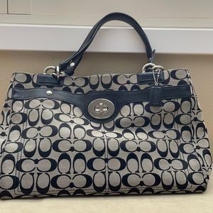 Coach black trim shoulder purse